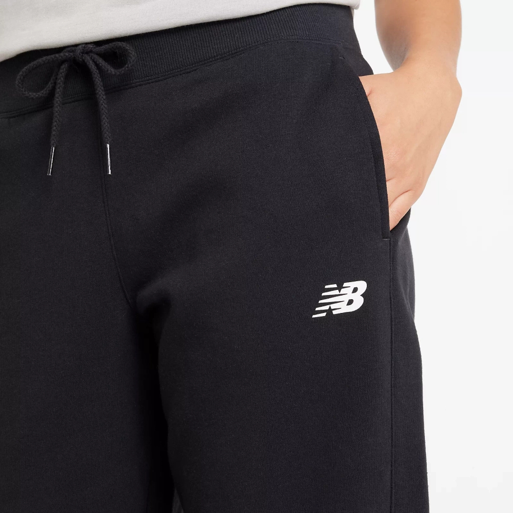 New Balance damskie spodnie dresowe SPORT FLEECE JOGGER BK WP43805BK